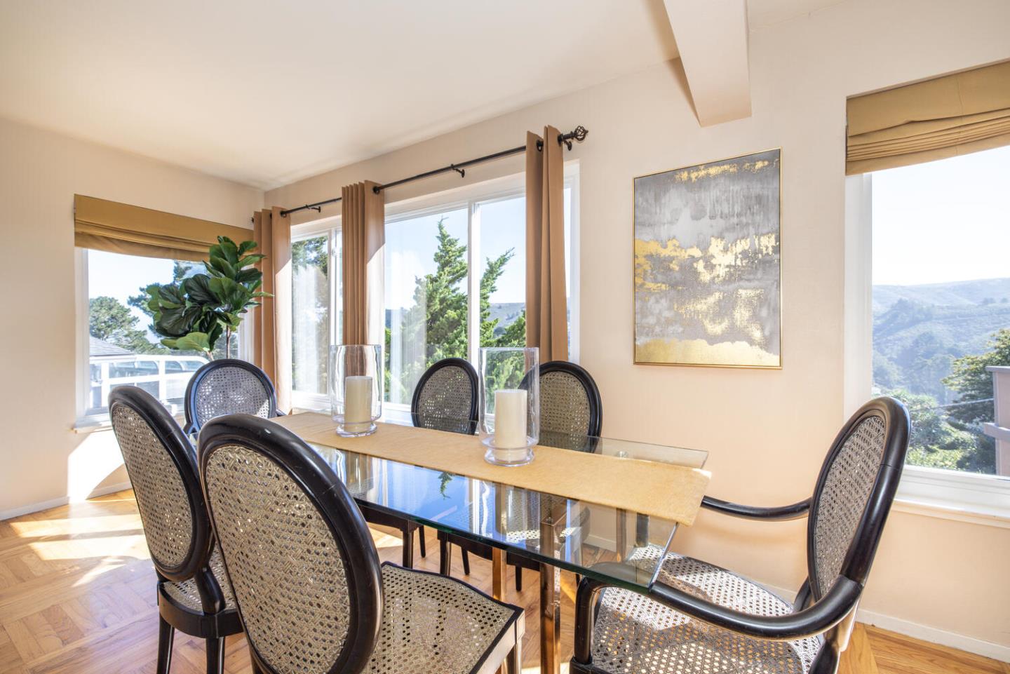 1420 Crespi Drive Pacifica, CA 94044 - Photo 24 of 48 a view of a city from a dining room with furniture window and wooden floor