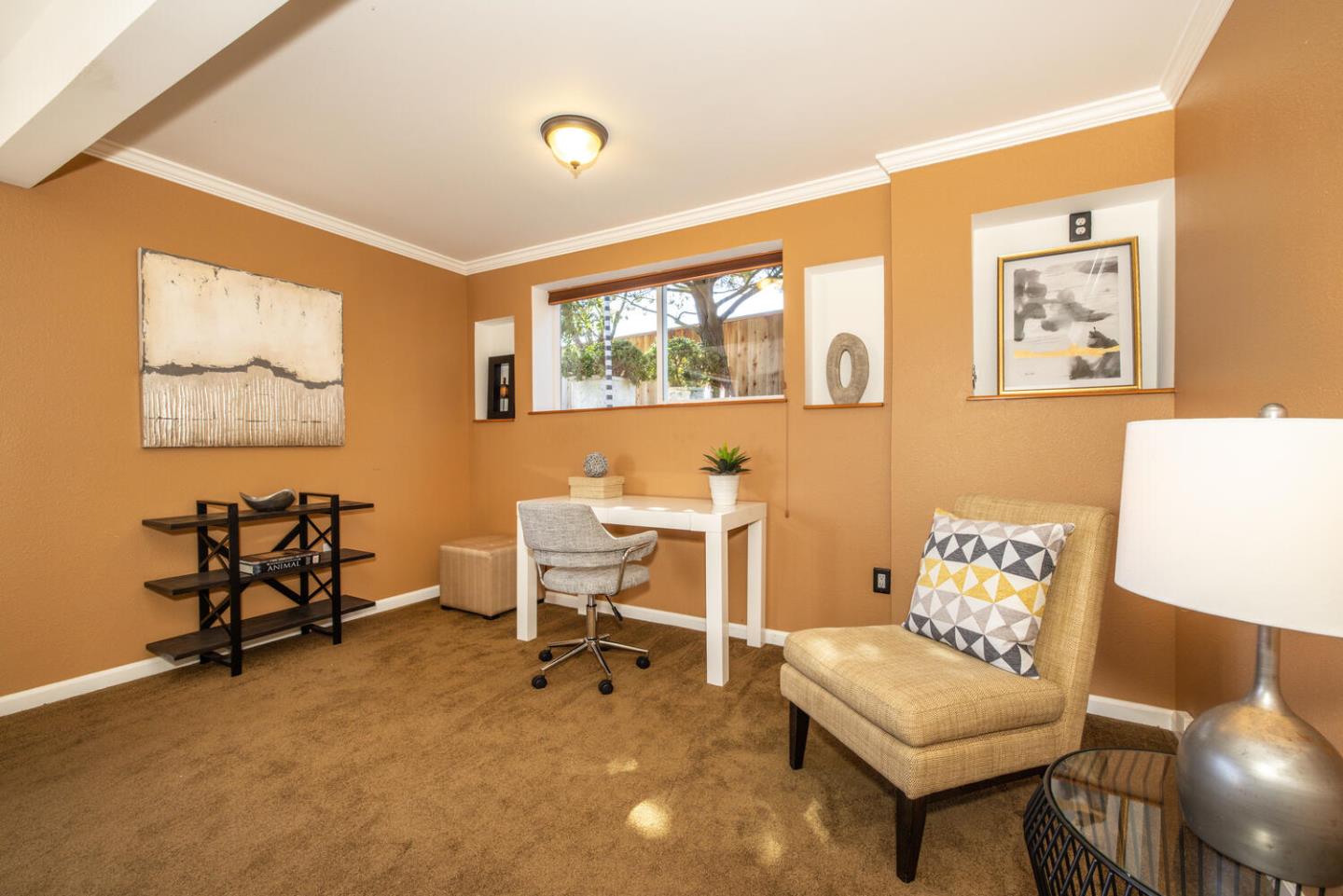 1420 Crespi Drive Pacifica, CA 94044 - Photo 35 of 48 a living room with furniture and a wall painting