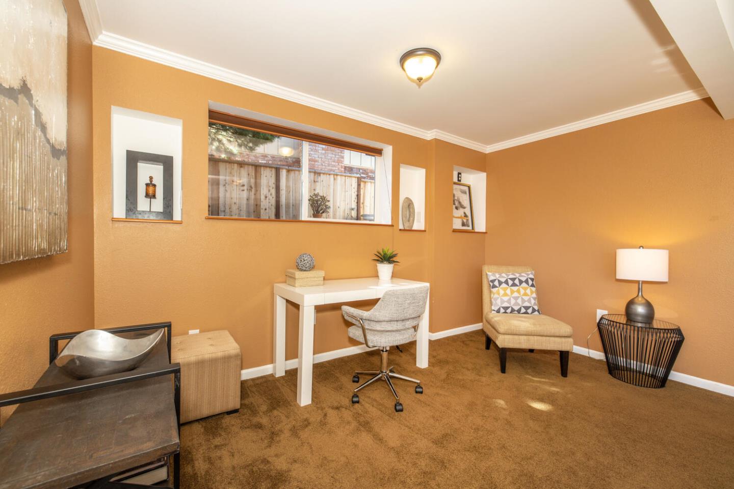 1420 Crespi Drive Pacifica, CA 94044 - Photo 37 of 48 a living room with furniture a rug and a table