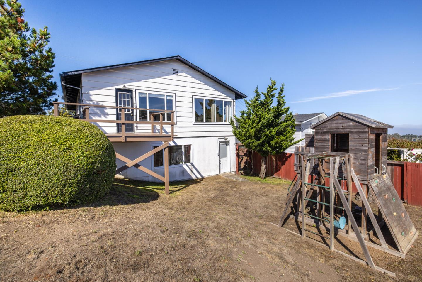 1420 Crespi Drive Pacifica, CA 94044 - Photo 4 of 48 a front view of a house with patio