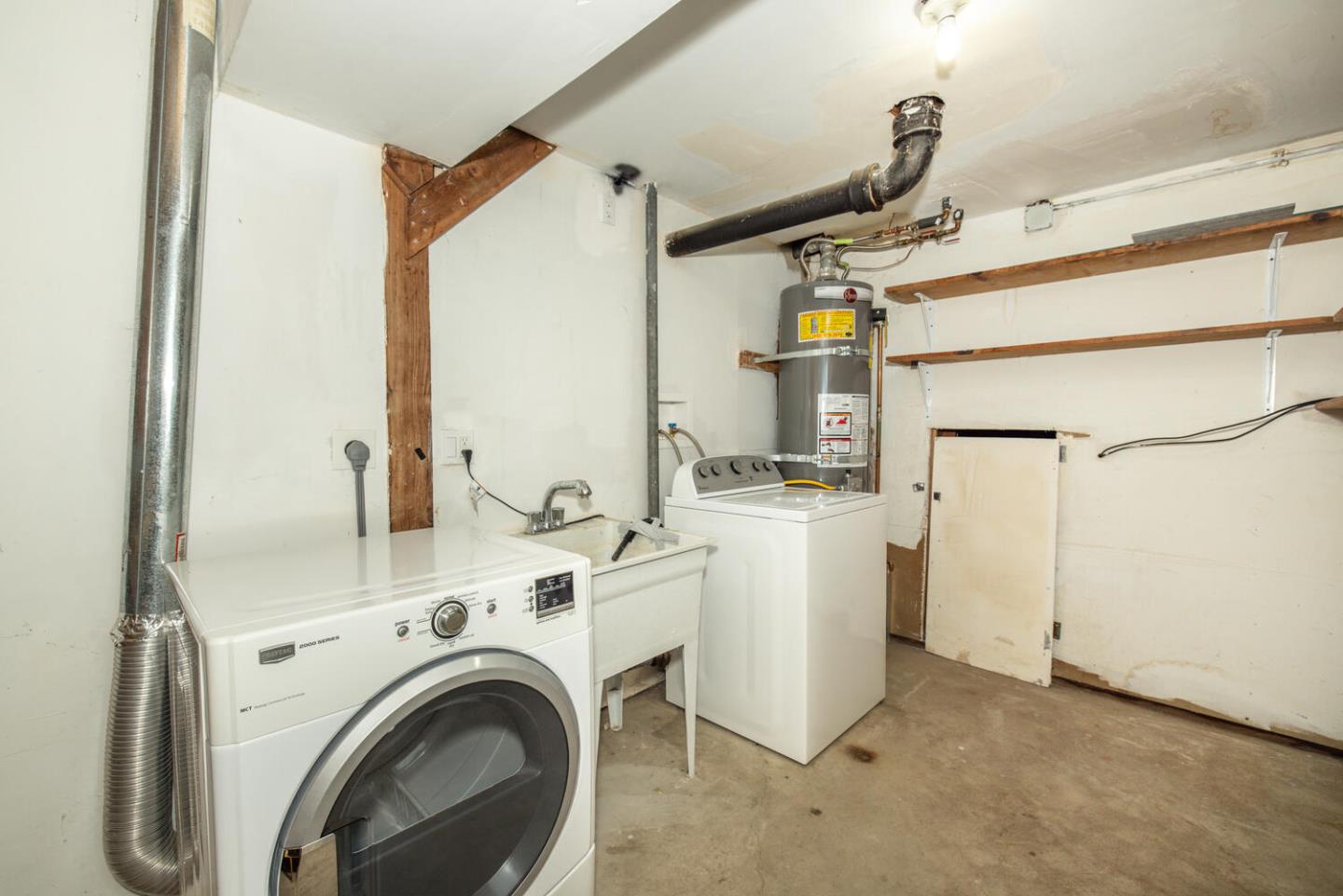 1420 Crespi Drive Pacifica, CA 94044 - Photo 42 of 48 a view of storage and utility room with washer and dryer