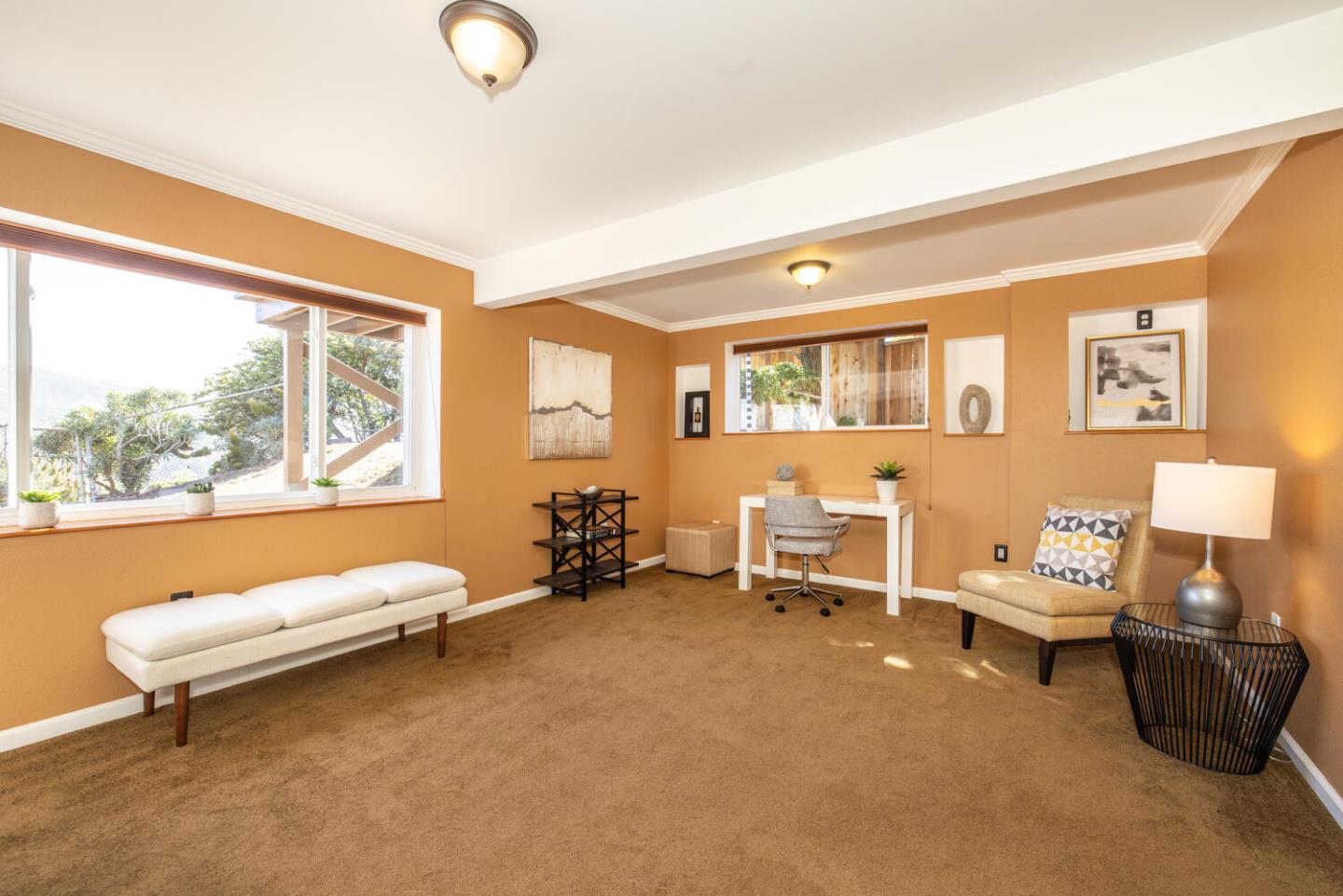 1420 Crespi Drive Pacifica, CA 94044 - Photo 46 of 48 a living room with furniture and a large window