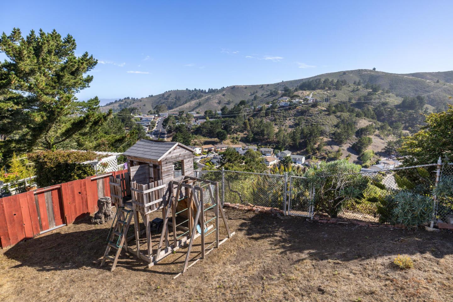 1420 Crespi Drive Pacifica, CA 94044 - Photo 48 of 48 a view of a house with a yard