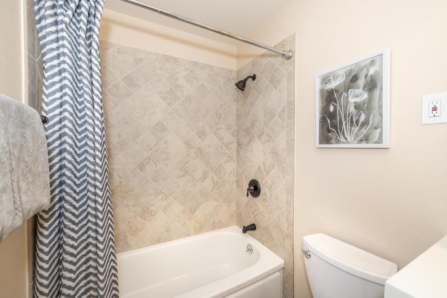 1420 Crespi Drive Pacifica, CA 94044 - Photo 9 of 48 a bathroom with a bathtub and shower