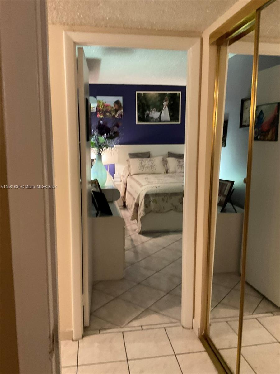 4675 West 18th Court, Unit 502 Hialeah, FL 33012 - Photo 2 of 13 a en suite bathroom with a toilet