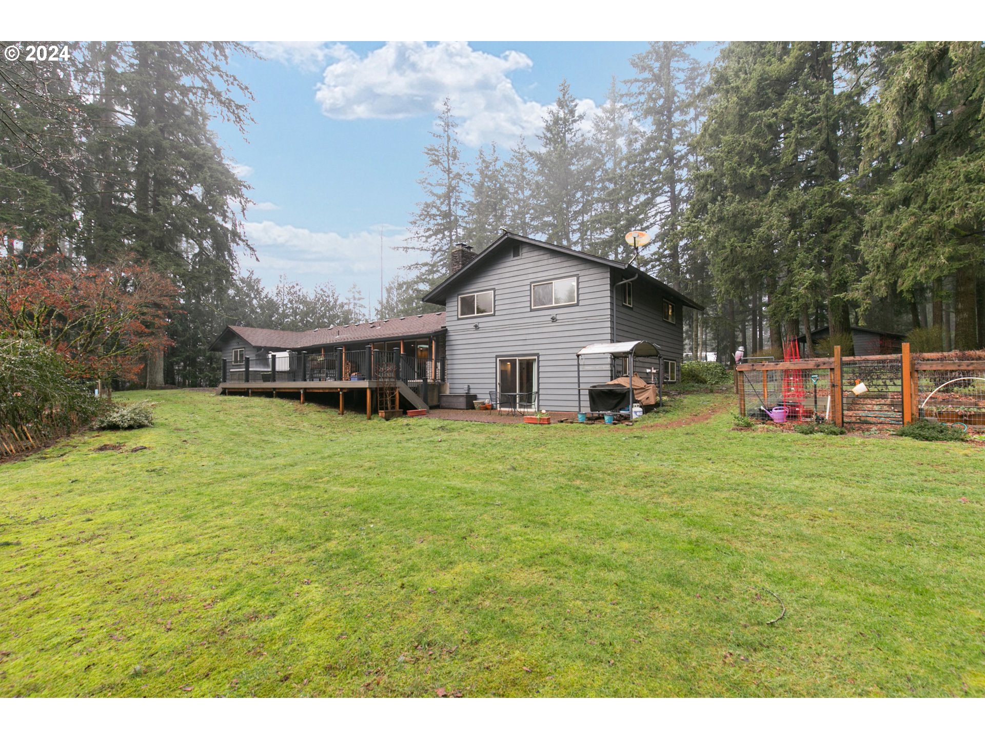 30416 Northeast Harrison Road Battle Ground, WA 98604 - Photo 28 of 39 a front view of a house with a garden