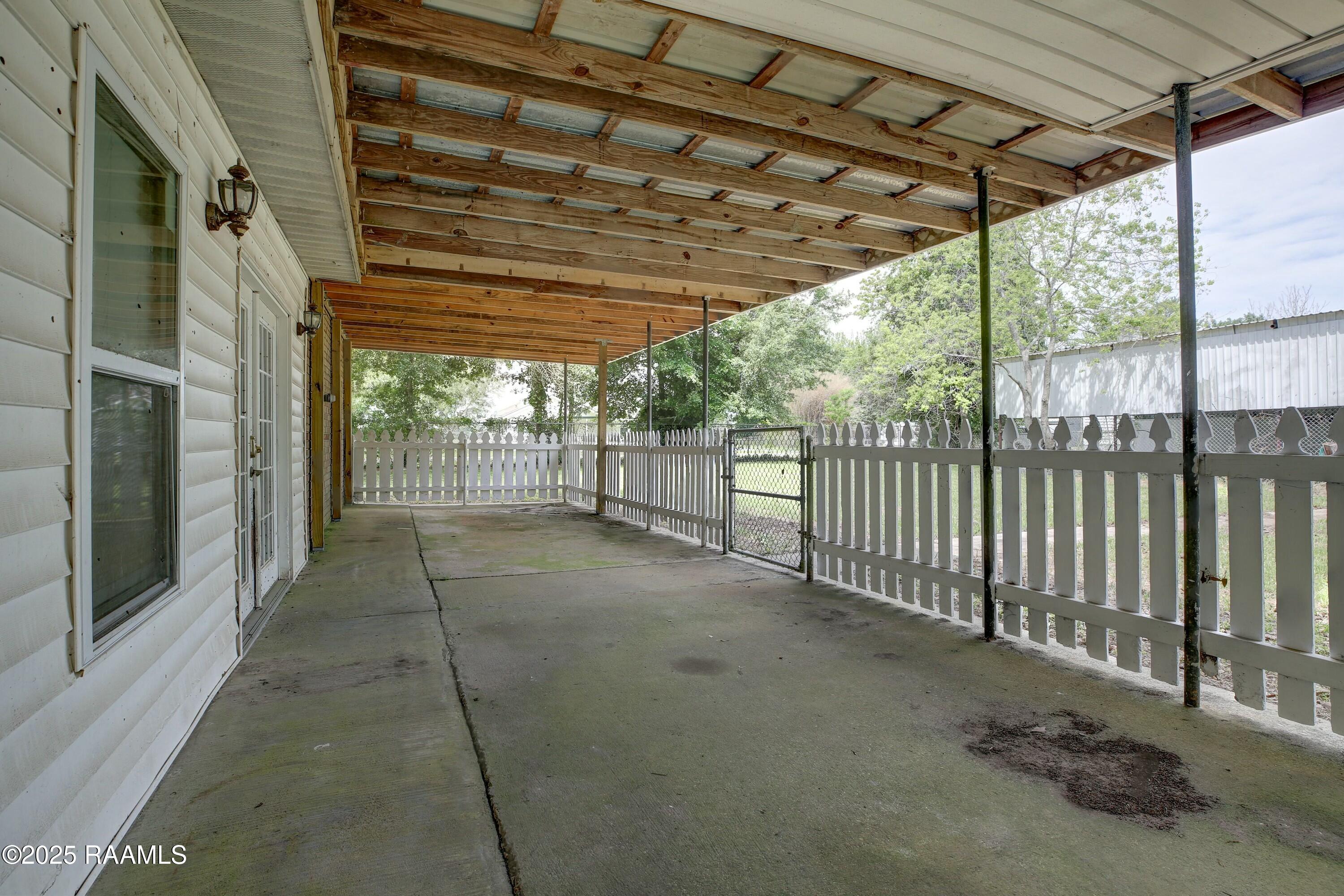 211 Dorsey Road New Iberia, LA 70563 - Photo 31 of 35 Patio Off Flex Room