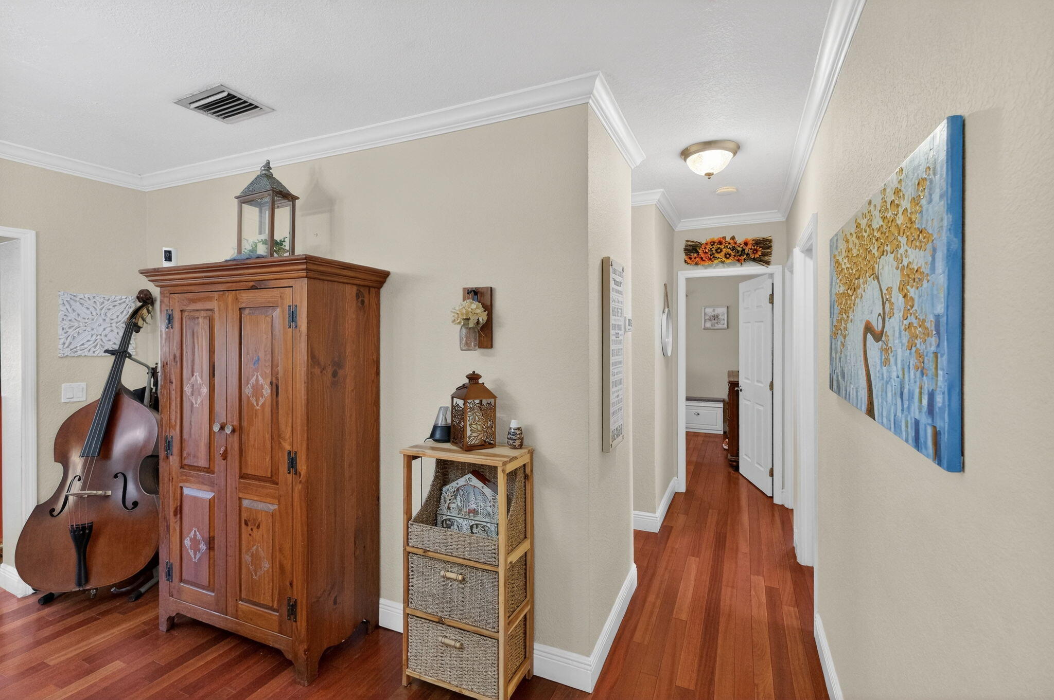 6091 Southwest 12th Street West Miami, FL 33144 - Photo 17 of 38 a view of a hallway with wooden floor and stairs
