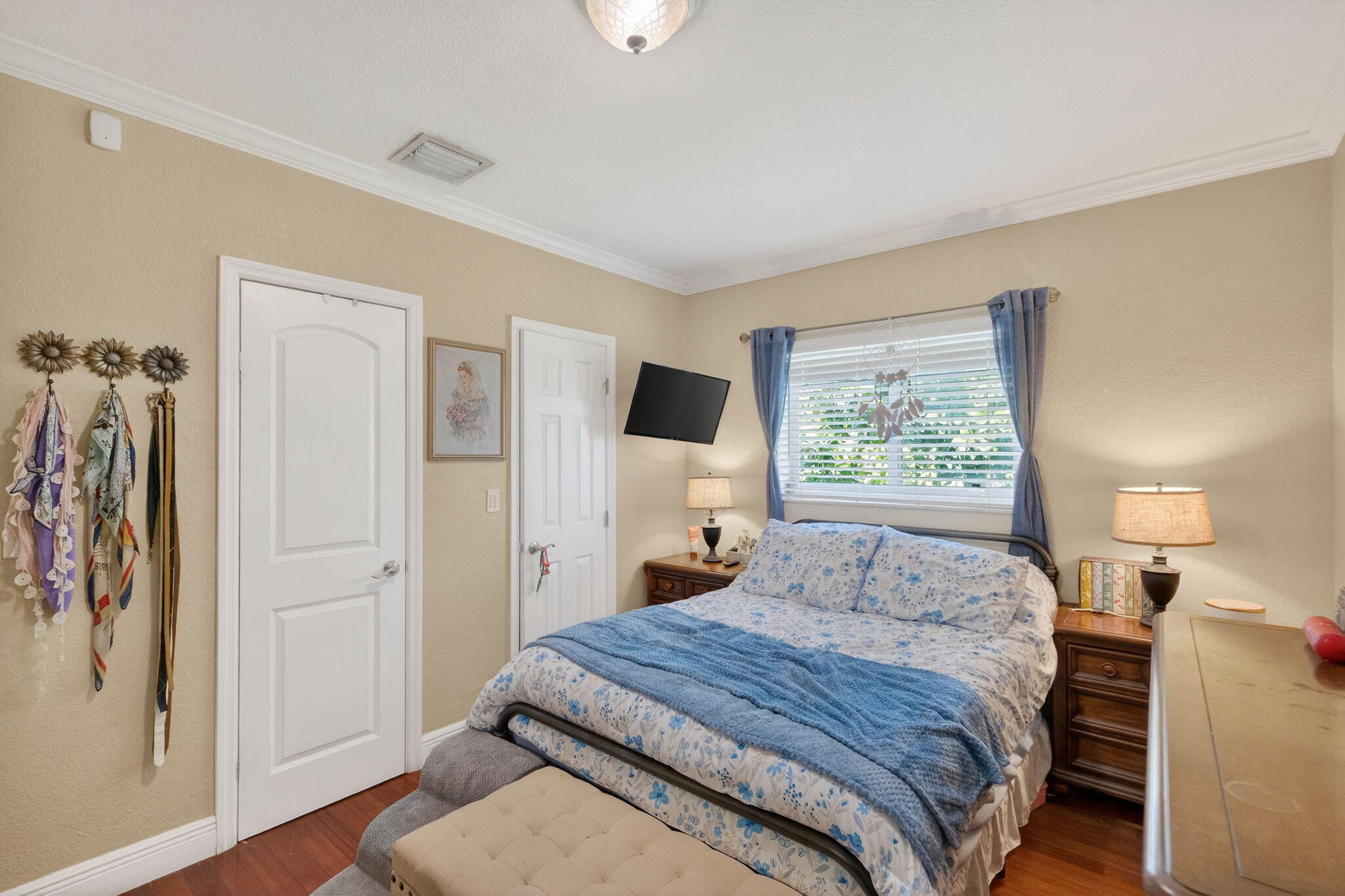 6091 Southwest 12th Street West Miami, FL 33144 - Photo 19 of 38 a bedroom with a bed and a window