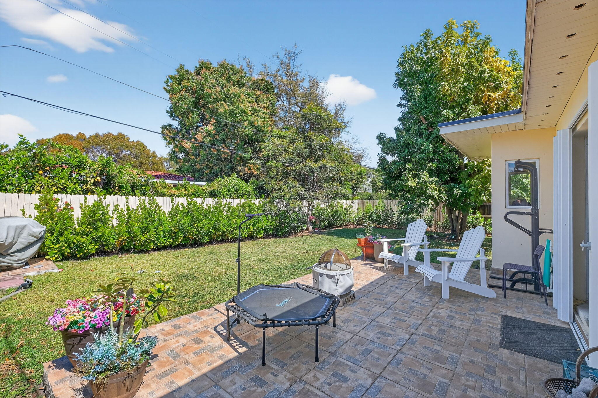 6091 Southwest 12th Street West Miami, FL 33144 - Photo 25 of 38 a garden view with a seating space