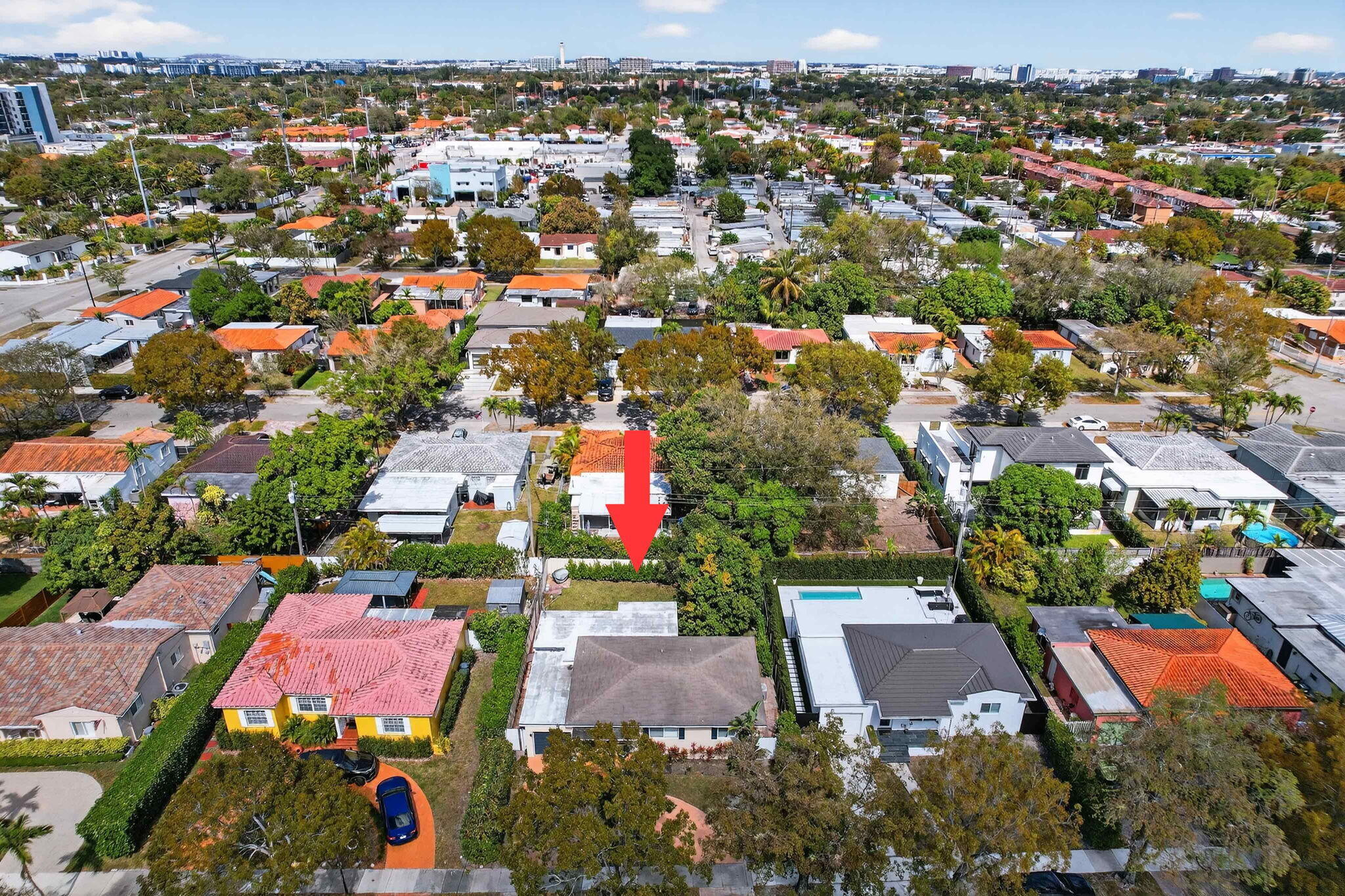 6091 Southwest 12th Street West Miami, FL 33144 - Photo 36 of 38 an aerial view of residential houses with outdoor space and parking