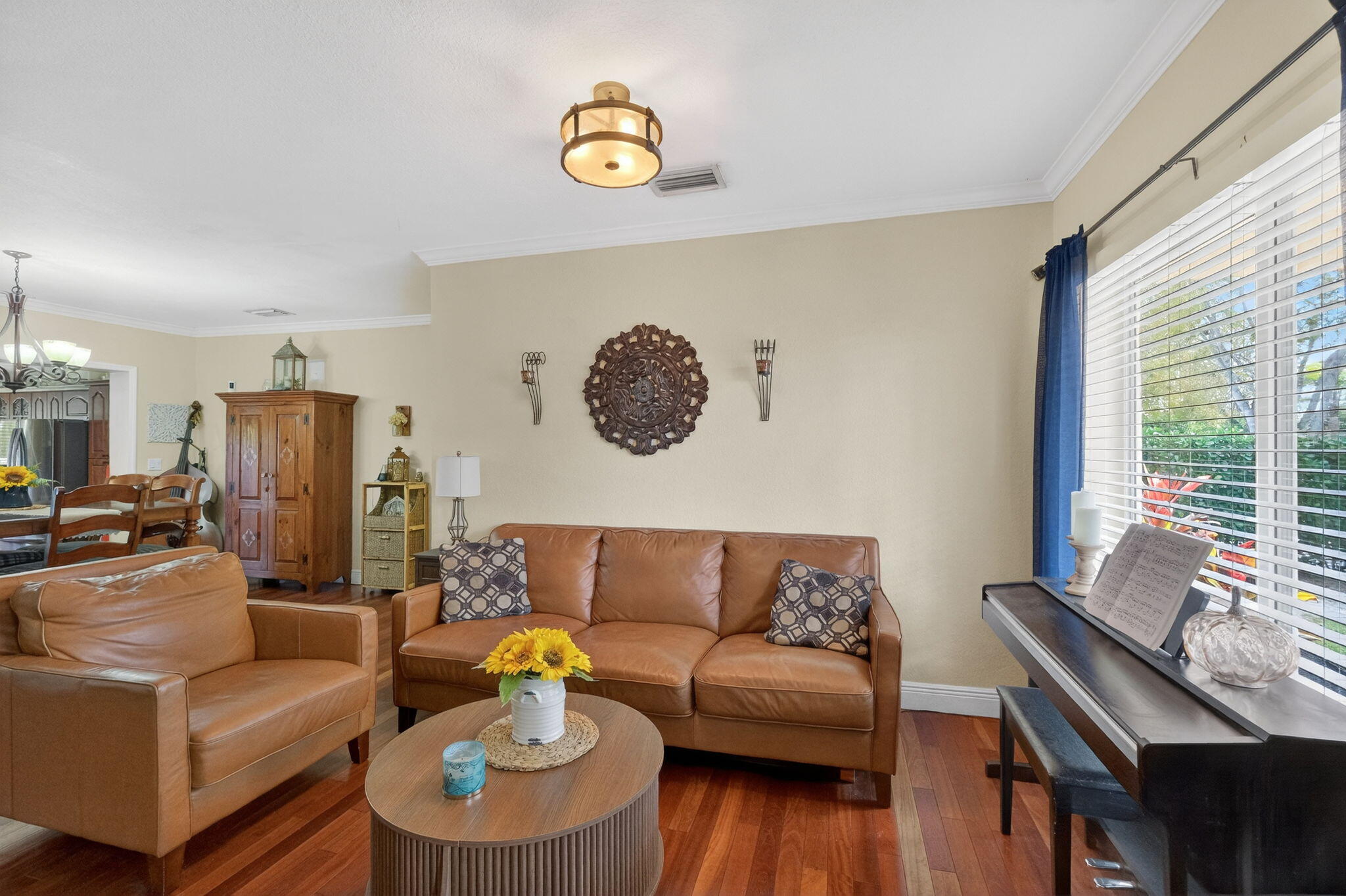6091 Southwest 12th Street West Miami, FL 33144 - Photo 6 of 38 a living room with furniture and a table