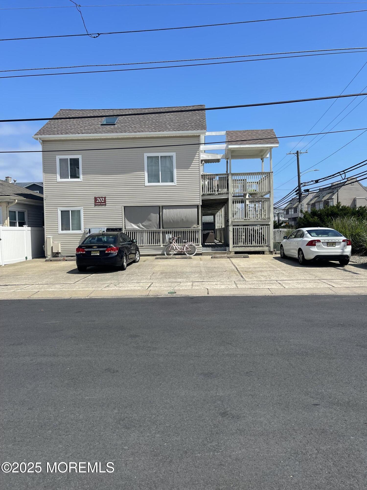 a car parked in front of a house