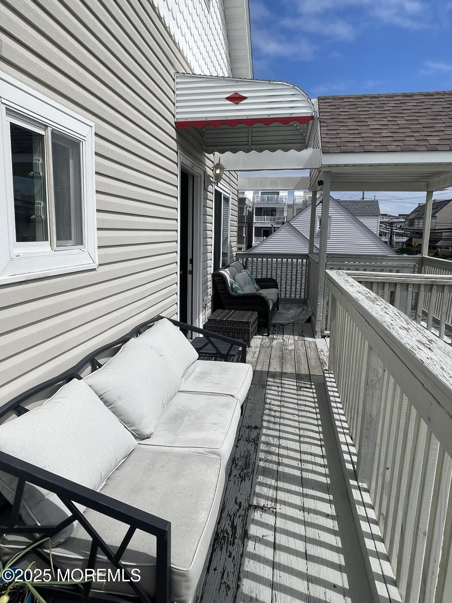 202 Carteret Avenue, Unit B5 Seaside Heights, NJ 08751 - Photo 17 of 17 a view of a balcony with furniture