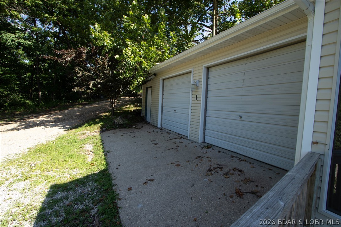 66 Spg Hl Road Sunrise Beach, MO 65079 - Photo 25 of 38 double car attached garage