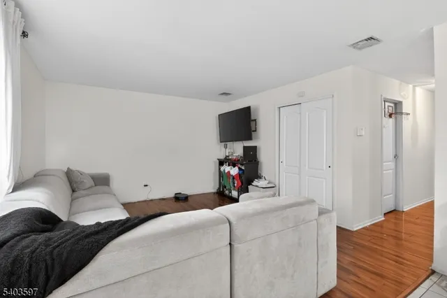 a bed room with a bed and a couch