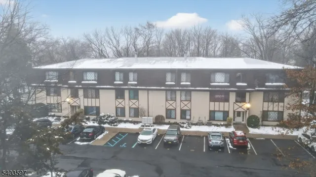 a view of a patio with couches and table and chairs