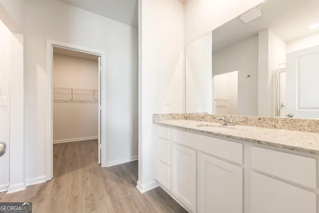 a kitchen with a stove and a microwave