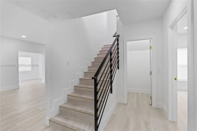 a view of entryway with wooden floor