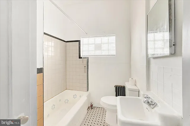 a front view of a house with entertaining space