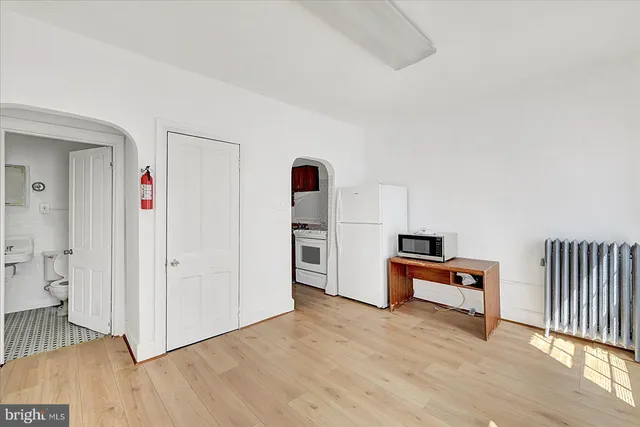 a bathroom with a bathtub and shower