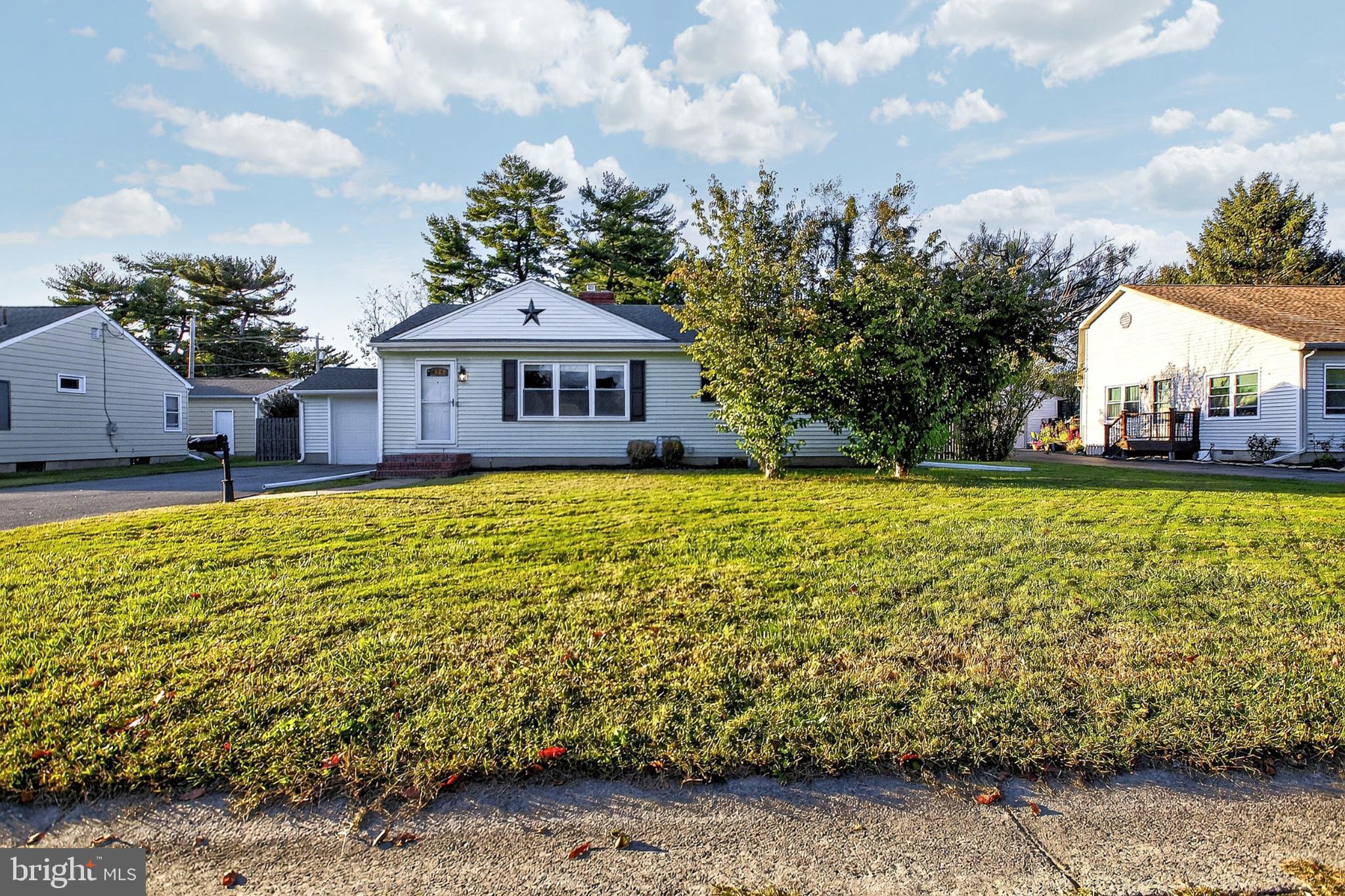 721 South Halsey Road Dover, DE 19901 - Photo 1 of 41 Charming home with lush green lawn.