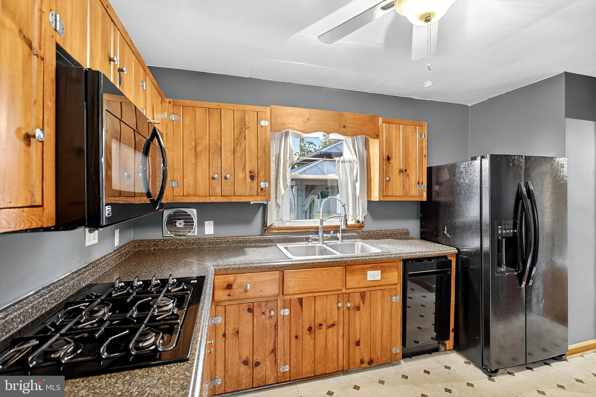 721 South Halsey Road Dover, DE 19901 - Photo 14 of 41 Charming kitchen with rustic wood accents.