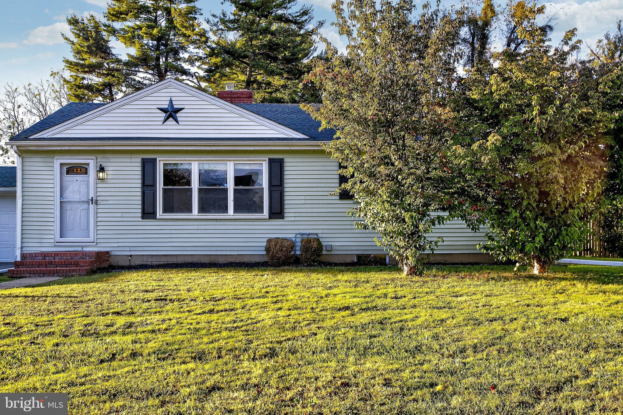 721 South Halsey Road Dover, DE 19901 - Photo 2 of 41 Charming home with lush greenery and character.