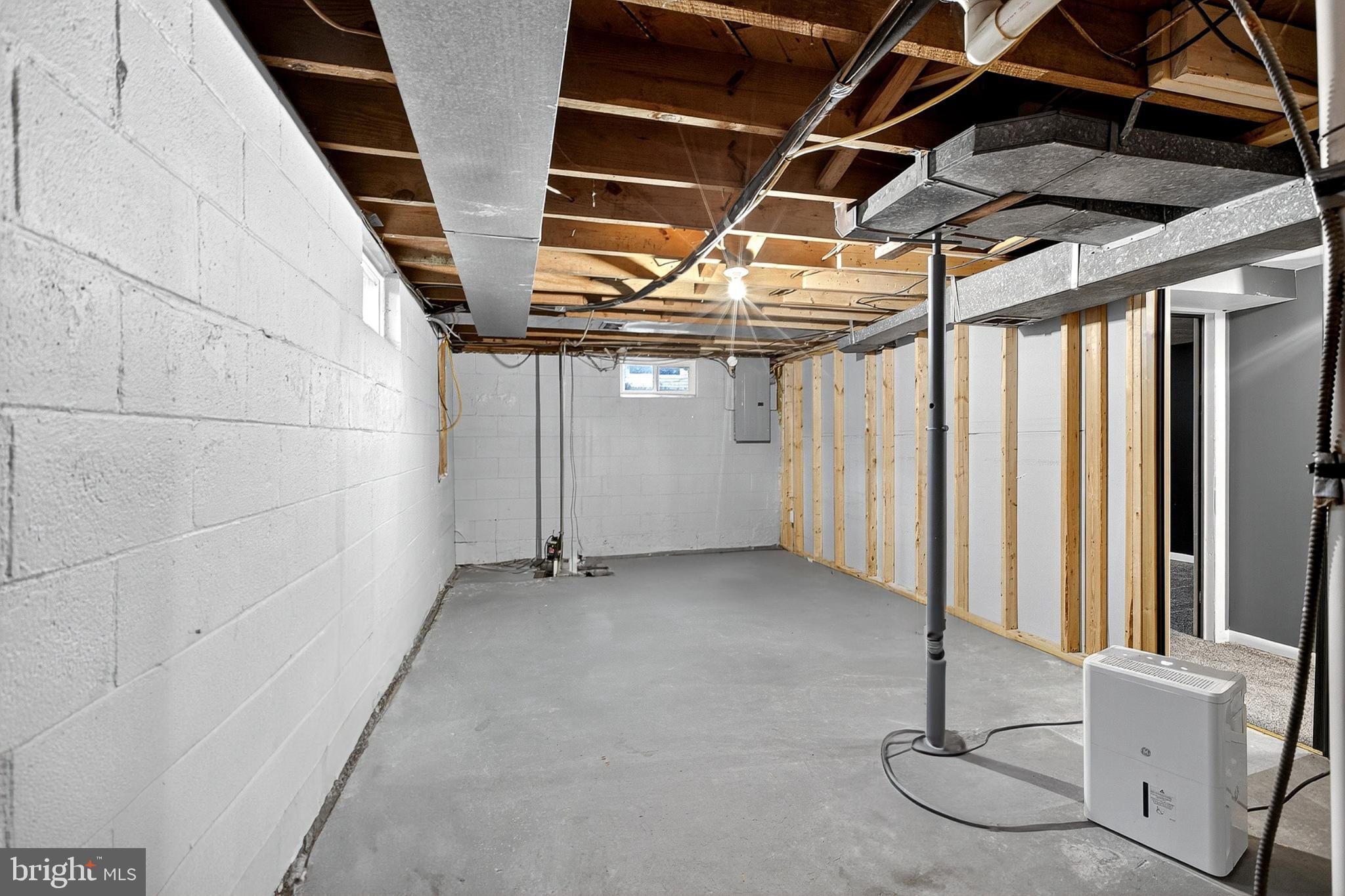 721 South Halsey Road Dover, DE 19901 - Photo 32 of 41 Spacious unfinished basement ready for ideas.