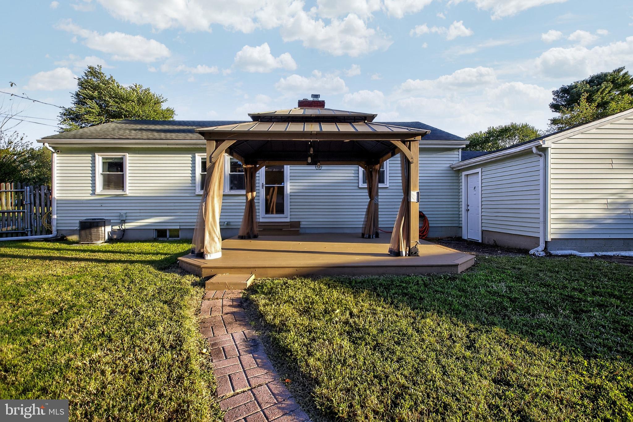 721 South Halsey Road Dover, DE 19901 - Photo 35 of 41 Charming backyard retreat with gazebo.