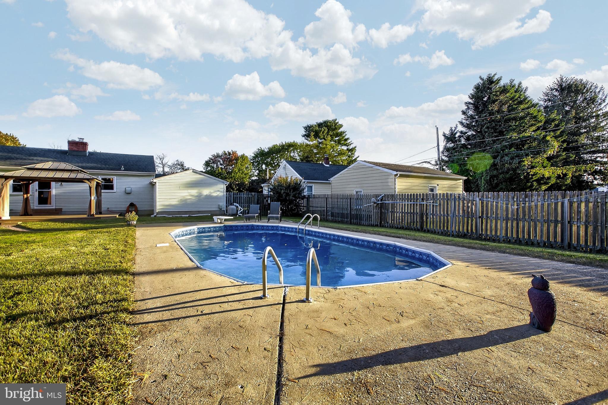 721 South Halsey Road Dover, DE 19901 - Photo 36 of 41 Sunny backyard oasis with inviting pool.