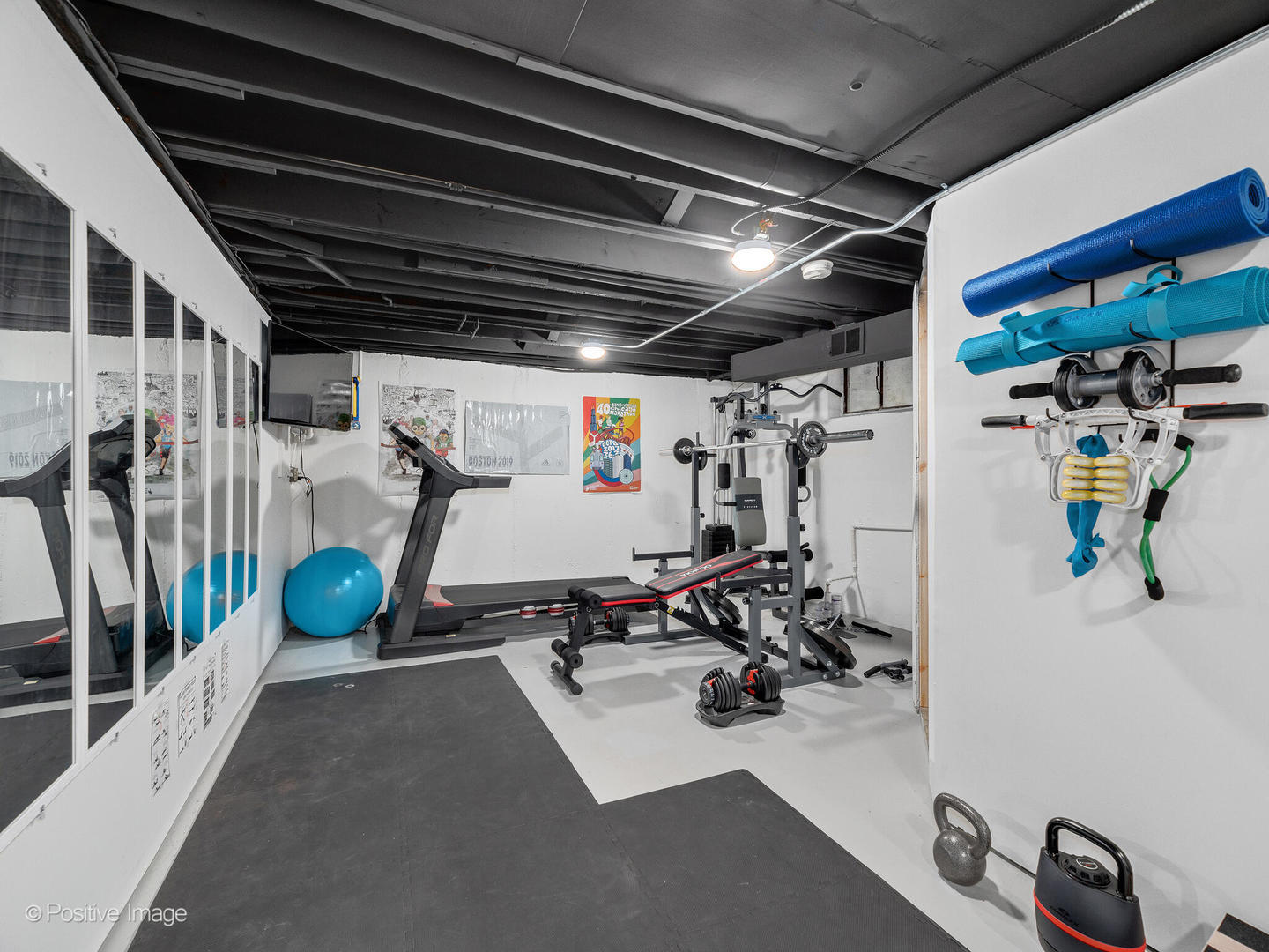 503 Kipling Court Wheaton, IL 60187 - Photo 19 of 27 a view of a room with gym equipment
