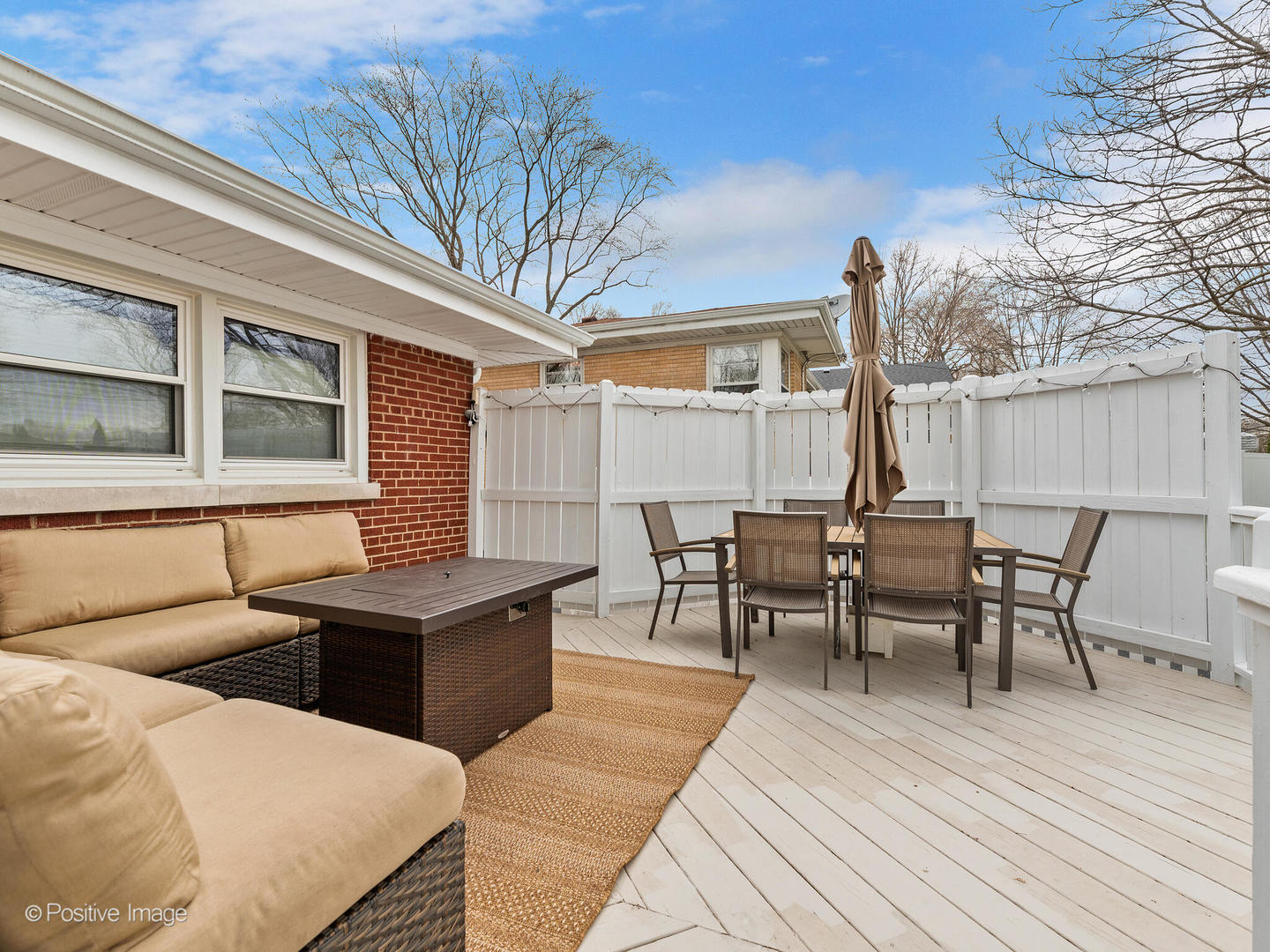 503 Kipling Court Wheaton, IL 60187 - Photo 20 of 27 a view of a patio with table and chairs with wooden floor and fence