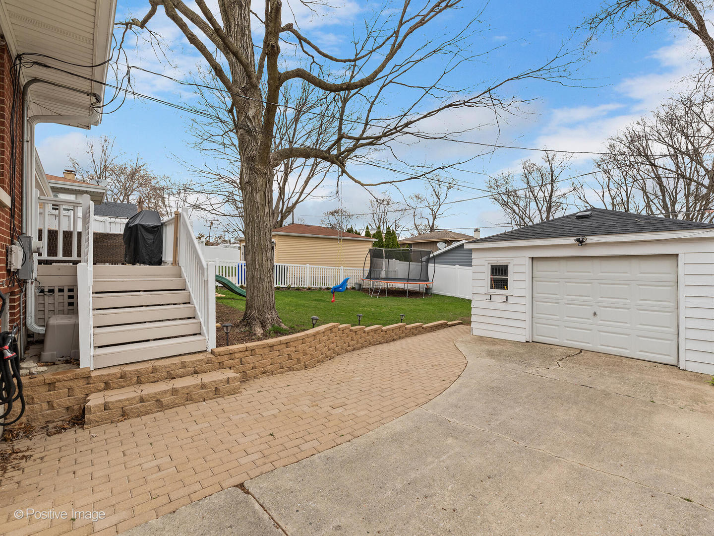 503 Kipling Court Wheaton, IL 60187 - Photo 22 of 27 a view of a house with a yard and garage