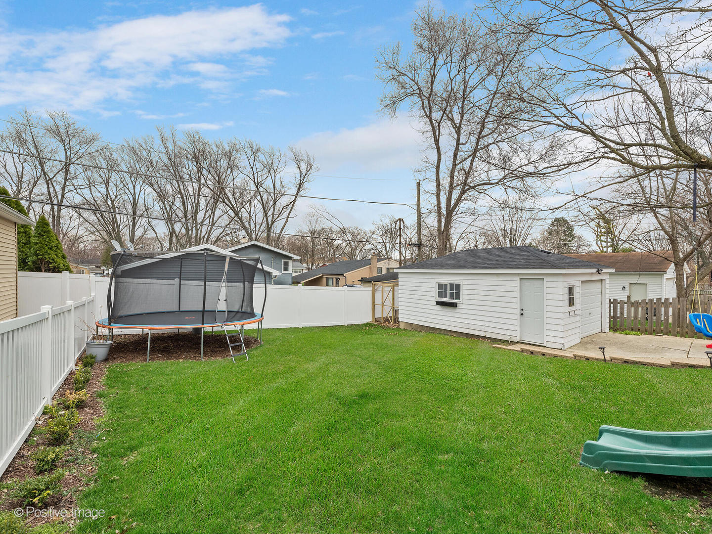 503 Kipling Court Wheaton, IL 60187 - Photo 24 of 27 a front view of a house with a yard and trees