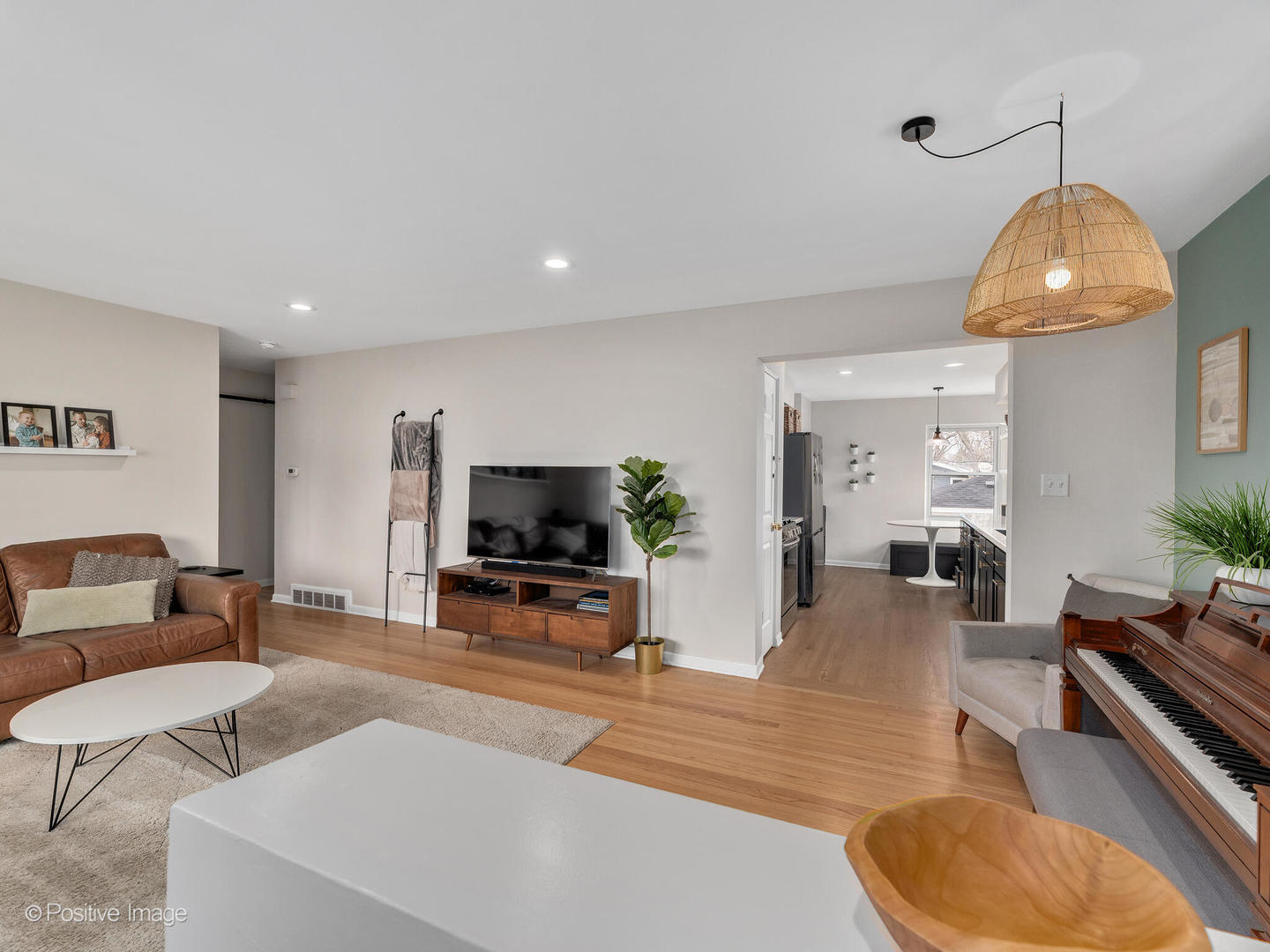 503 Kipling Court Wheaton, IL 60187 - Photo 5 of 27 a living room with furniture and a flat screen tv