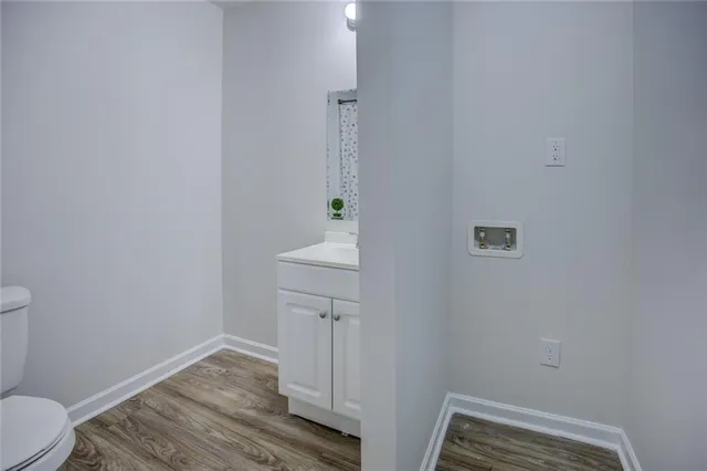 a bathroom with a sink and a toilet
