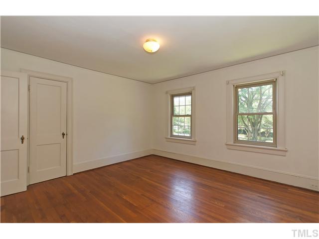106 North King Charles Road Raleigh, NC 27610 - Photo 18 of 25 Front Bedroom With Ample Closet Space.. Across From This Bedroom Is A Doorway To The Walk Up Floored Attic. Don't Miss This Great Detail!