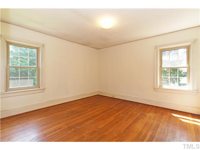 106 North King Charles Road Raleigh, NC 27610 - Photo 19 of 25 Back Corner Bedroom With Two Windows Overlooking The Side And Backyard.