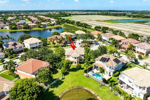 an aerial view of a house with a garden