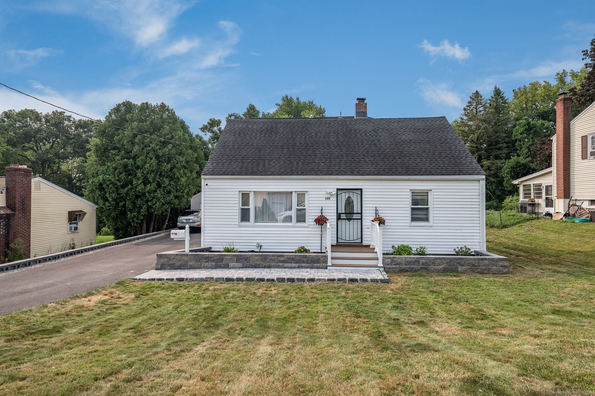 125 Lewis Road New Britain, CT 06053 - Photo 1 of 1 Front of 125 Lewis Road with pretty walkway.
