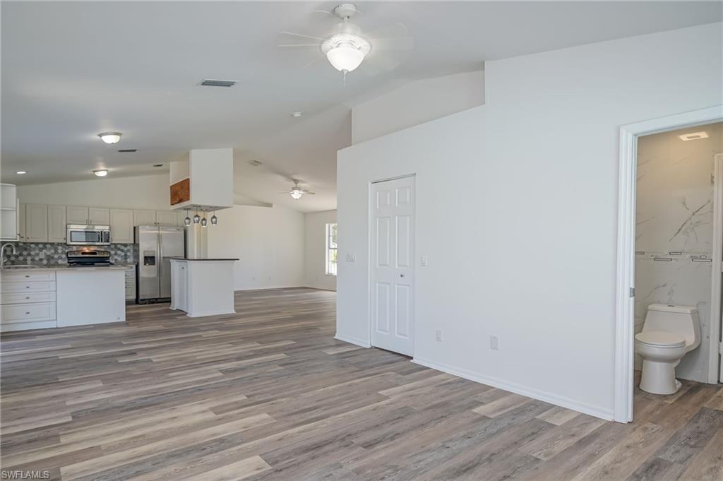 18441 Columbine Road Fort Myers, FL 33967 - Photo 13 of 33 a view of kitchen view and wooden floor