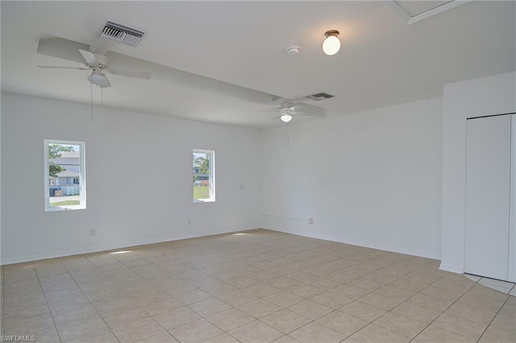 18441 Columbine Road Fort Myers, FL 33967 - Photo 15 of 33 an empty room with a empty space and windows