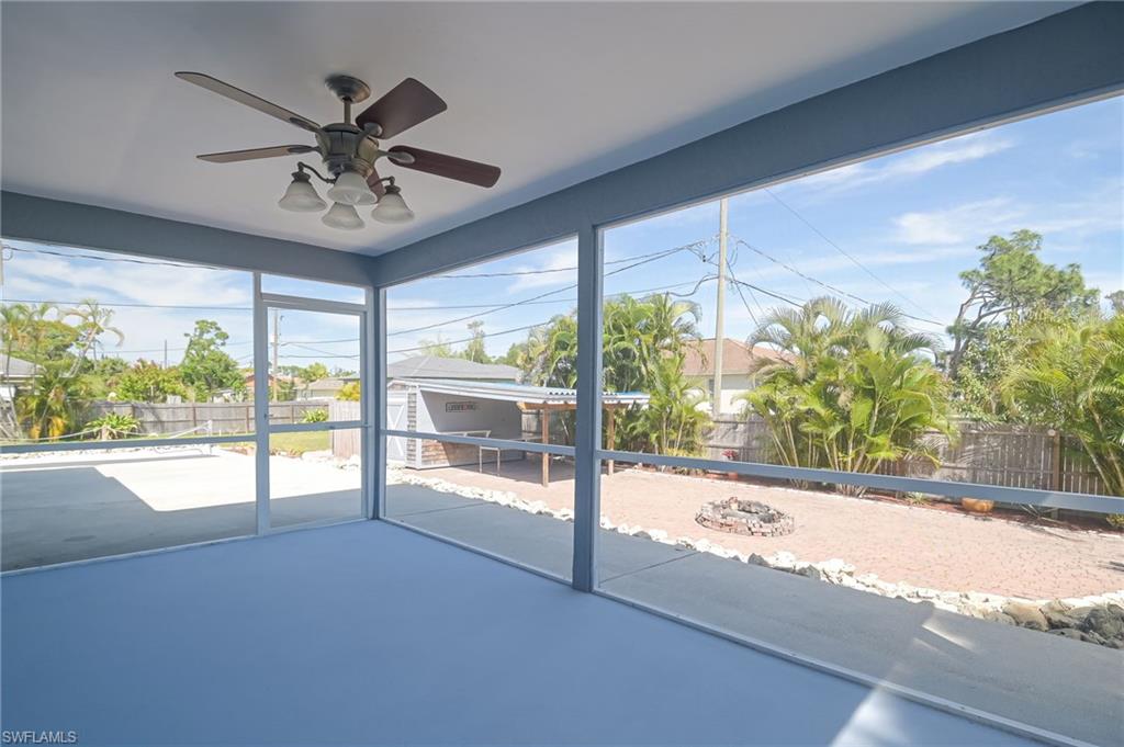 18441 Columbine Road Fort Myers, FL 33967 - Photo 27 of 33 a view of a livingroom with a ceiling fan and a large window
