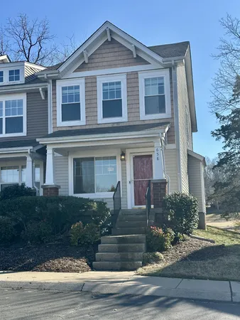 a front view of a house with garage