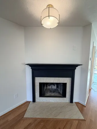 a living room with a fireplace