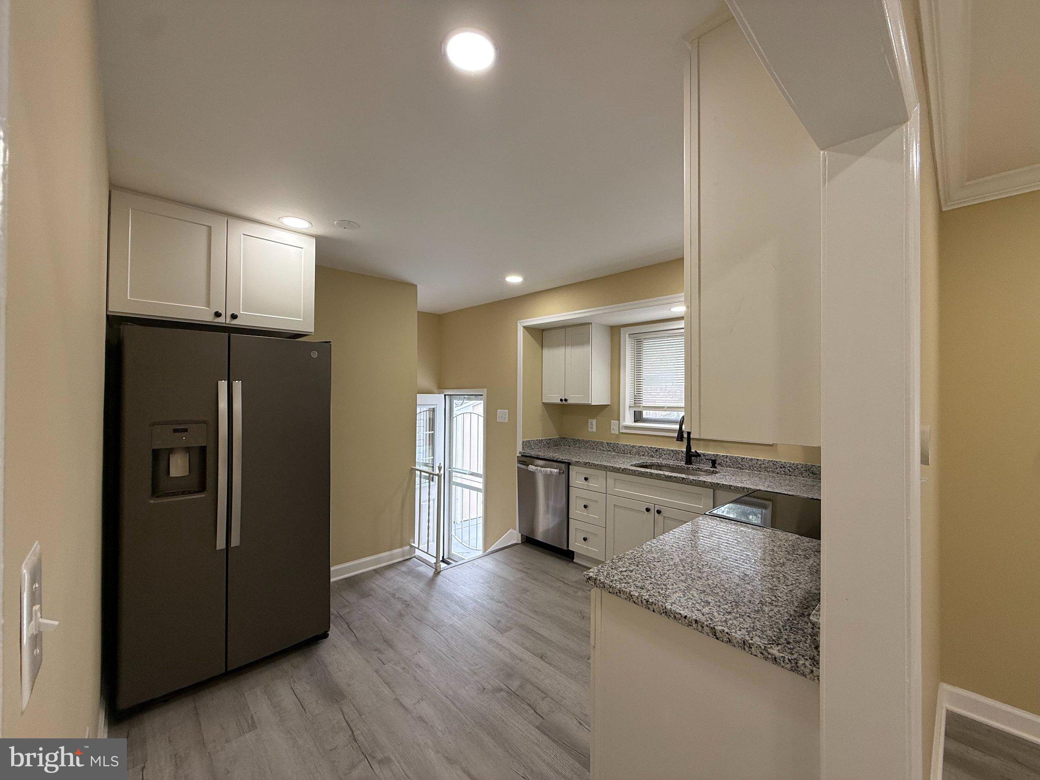 6909 Digby Road Gwynn Oak, MD 21207 - Photo 11 of 48 Kitchen with New Countertops and Appliances