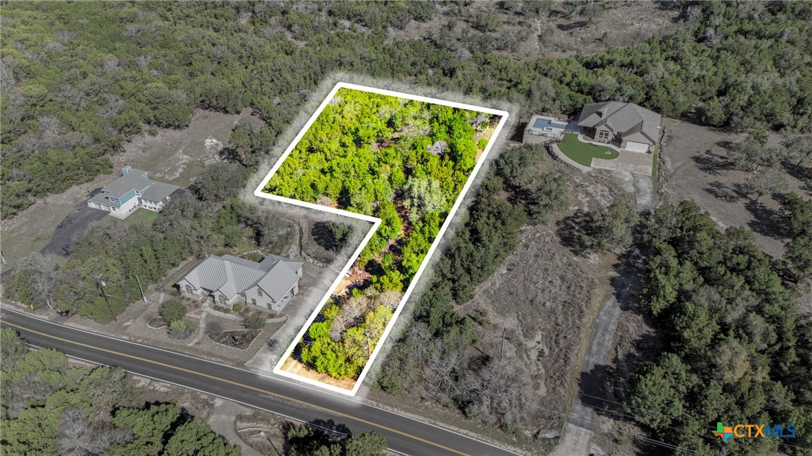 1025 Flaman Road Canyon Lake, TX 78133 - Photo 20 of 31 view of a back yard of the house