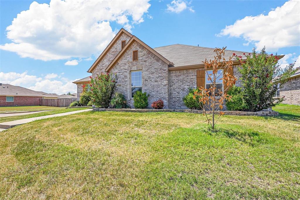 1948 Day Break Drive Lancaster, TX 75146 - Photo 1 of 25 a view of a house with a yard
