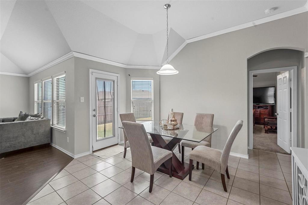 1948 Day Break Drive Lancaster, TX 75146 - Photo 9 of 25 a dining room with furniture and wooden floor